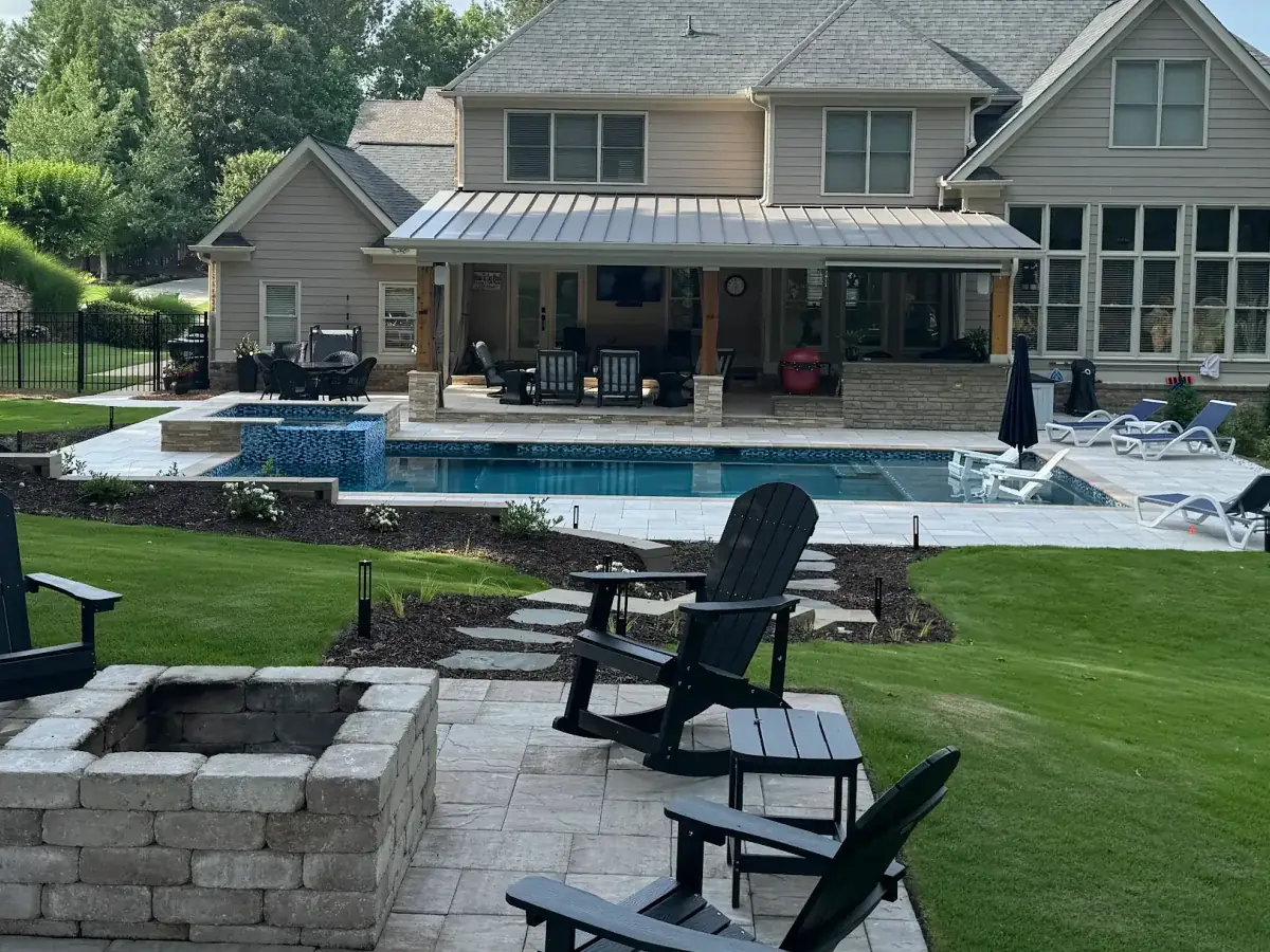 Acworth RutherfordMade custom pool with cabana, retaining wall, and outdoor living space