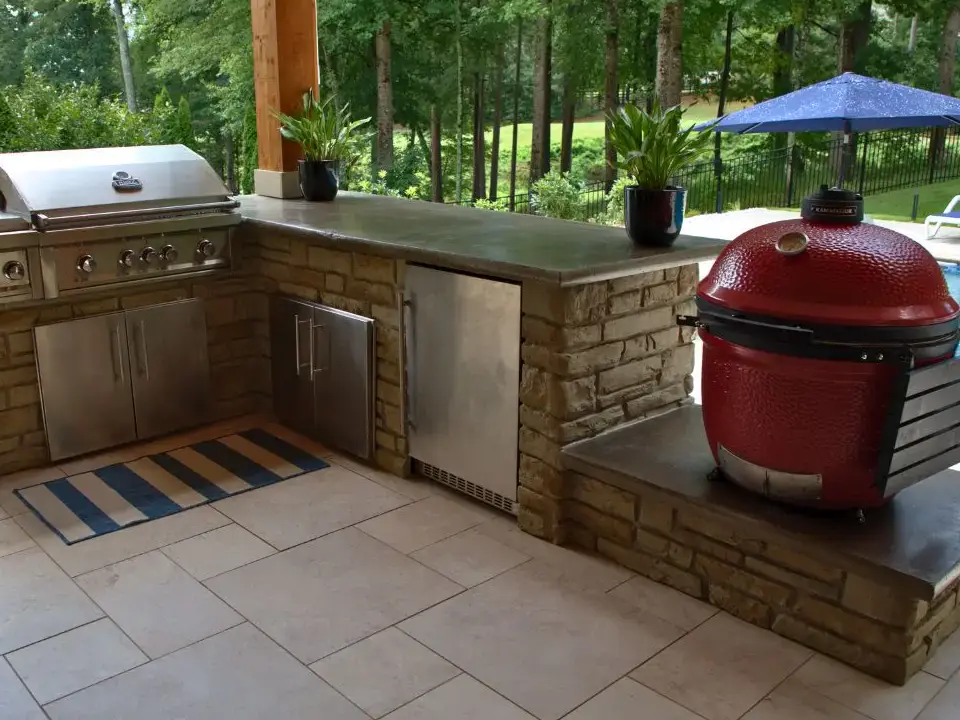 Acworth RutherfordMade covered outdoor kitchen with stone counters and built-in grill